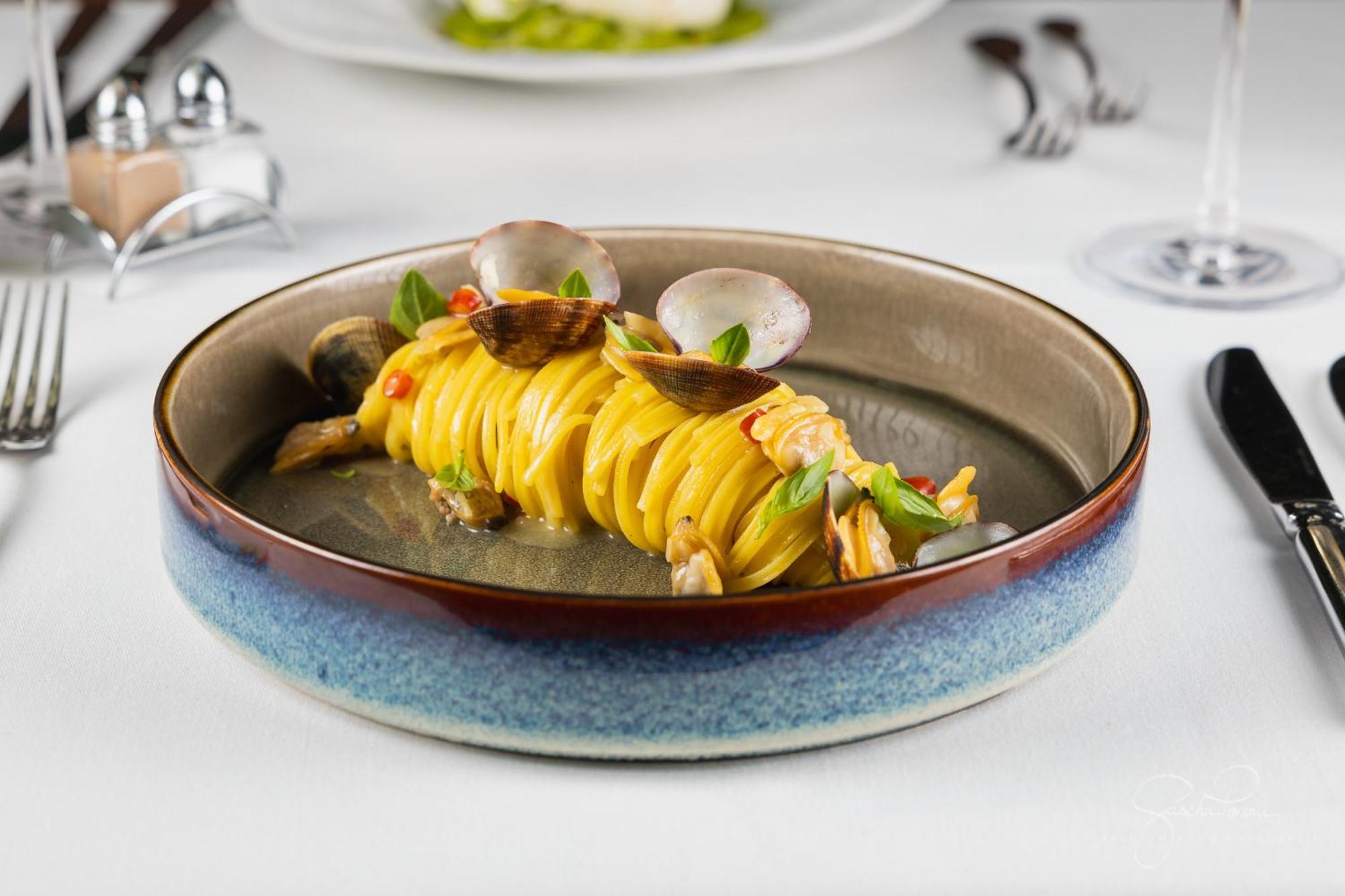 The Wellem, In The Unbound Collection By Hyatt Hotel Düsseldorf Exterior foto A dish of spaghetti alla vongole